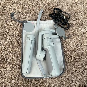 DJI bran new out of box selfie stick.